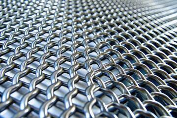 Obraz premium Silver mesh material used for industrial or technical purposes, utilitarian, metallic