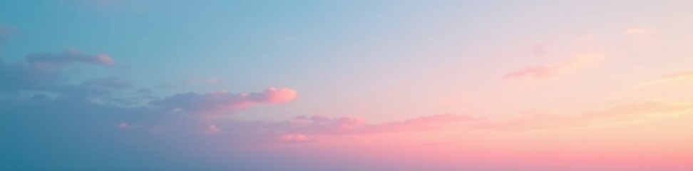 Fototapeta premium Softly gradating light pink to blue hues in the sky with shades of orange at sunset, blue, gradient, texture