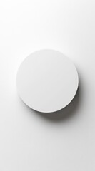 Minimalist white circle on white background, simple geometric shape, clean design.
