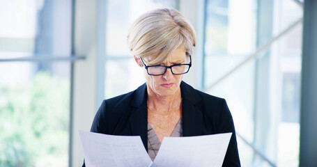 Documents, business woman and compare in office for legal case, proposal and project or research....
