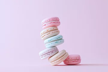 Close up of macarons in a spiral pattern, set against a soft pastel background for an elegant touch