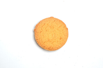 Round cookies isolated on white background. Sweet and crunchy taste.Snack food industry concept.Copy space for text.For graphic design or banner background