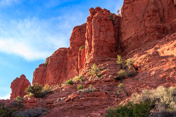 Fototapeta premium A rocky mountain with a few trees on it
