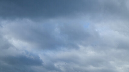 Thick cloudy abstract pattern and texture background.Natural background.Cloudy blue mixed with gray.Copy space for text.Climate and weather concept.For graphic design and banner background