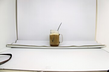 Jasmine Iced Coffee. Made from premium Arabica beans and infused with the subtle sweetness of jasmine, this chilled beverage offers a smooth and invigorating taste.