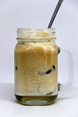 Jasmine Iced Coffee. Made from premium Arabica beans and infused with the subtle sweetness of jasmine, this chilled beverage offers a smooth and invigorating taste.