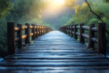 Obraz premium Wooden bridge in a misty forest during sunrise