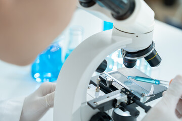 Scientist analyze biochemical samples in advanced scientific laboratory. Medical professional use dropper mix microbiological developmental of viral. Biotechnology research in  science lab. cosmetic