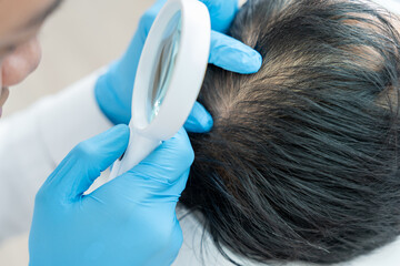 Specialist of hair check health of hair for Asian man, damaged hair, hair loss, thinning problem,...
