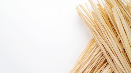 Neatly Arranged Straw Packing Material on White Background for Eco-Friendly Packaging Concepts