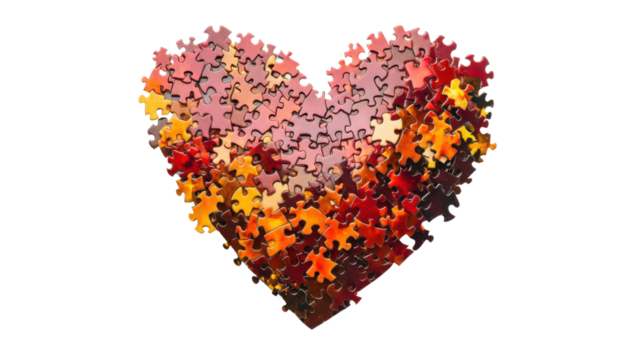 Puzzle pieces forming a heart shape on transparent background
