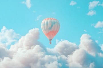 Naklejka premium A hot air balloon is floating in the sky above a cloudy blue sky