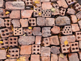 Red old broken bricks texture background