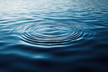 Ripple effects on a still water surface, creating gentle waves and smooth, circular patterns with a sense of calm and tranquility