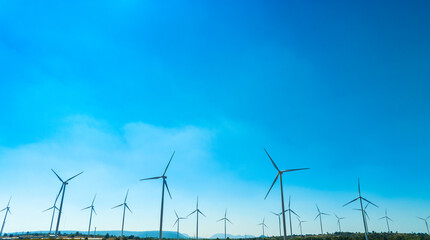 Wind farm on the mountain on blue sky day wind energy concept alternative energy Renewable energy	