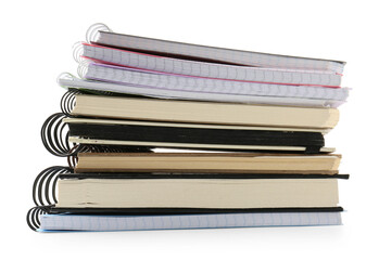 Stack of different notebooks isolated on white