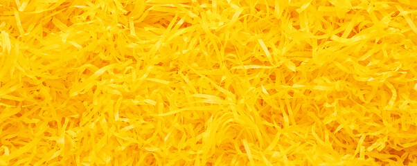 Obraz premium Heap of yellow shredded paper as background