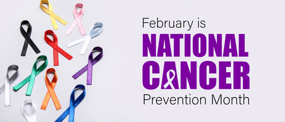 Different colorful ribbons on grey background. Cancer awareness concept