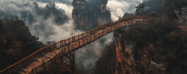Wooden walkway winding through misty mountains of Shandong, China at night showcasing scenic beauty