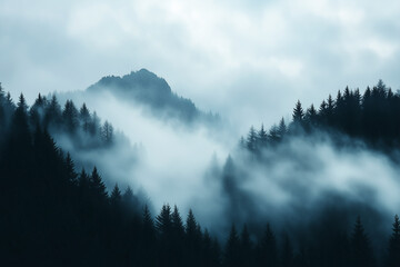 Fototapeta premium Misty mountain peaks rising above dense fog, creating a mystical atmosphere with copy space.