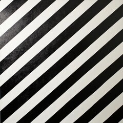 Striking black and white diagonal stripes create a bold geometric pattern, ideal for modern backgrounds and textures.