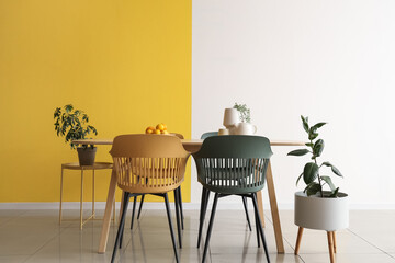 Interior of room with dining table and plants