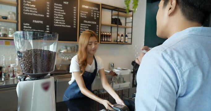 Customer using e-payment with mobile