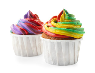 Delicious cupcakes with colorful cream isolated on white