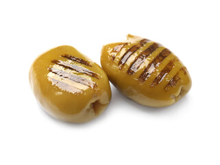 Two grilled green olives isolated on white