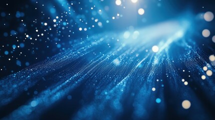 Obraz premium Vibrant blue abstract artwork with flowing patterns and luminous effects in a dark background