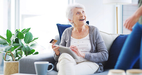Happy, senior woman and credit card with tablet for online shopping, ecommerce and bills payment....