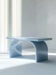 Light blue modern minimalist curved bench in bright room.
