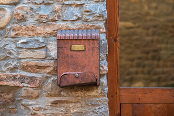 Vintage metal letter boxes on a house wall