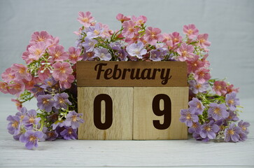 Wooden Calendar Showing the Date of February 9th. Day 9 of February month