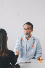 Doctor gives patient prescription medication