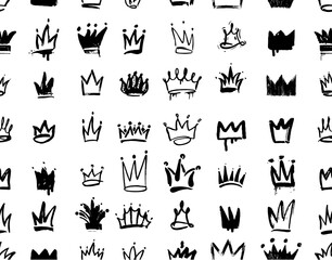 Crowns are painted with a brush seamless pattern. King black crown sketches. Queen royal diadems vector ornament. Ornament with grunge charcoal hand drawn heads tiaras. Doodle diadems seamless banner. © Anatoliy