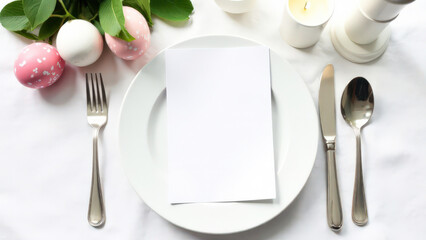 Mock up white card with a place for menu text lies on a white plate, silver cutlery nearby, candle, decor of roses and painted pink and white egg, Easter concept
