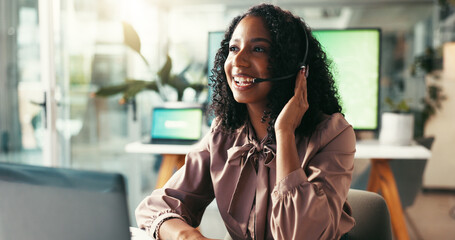 Woman, headset and happy in call center for customer service, assistance and contact at computer. Insurance agent, technology and smile in office for help, sales pitch or telecommunication for advice