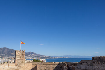 Photo of the Spanish flag showing the flag from Spain blowing in the wind on a clear sunny summers...