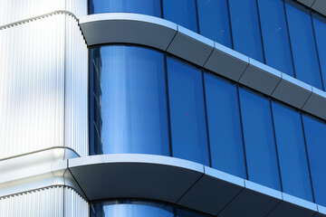 modern glass building with geometric architectural design