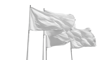 White flags fluttering against a clear sky during a peaceful protest in an urban area