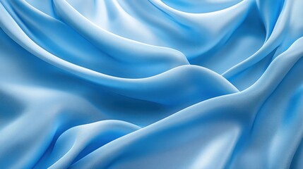 Fototapeta premium Blue silk fabric draped elegantly, studio shot, soft light background, textile design