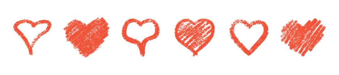 Red crayon heart collection with textured effect - vector hand drawn romantic shapes in sketchy style showing different strokes and filling patterns. Scribbled love symbols for valentine designs.