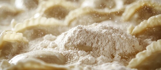 Obraz premium Close-up of flour mound on soft dumplings and ravioli highlighting textures with golden hues and a blurred background of pasta inviting focus on details