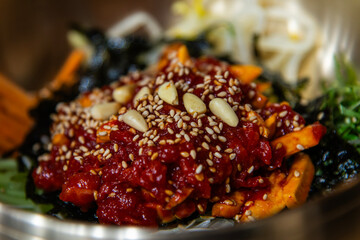 beef sashimi bibimbap in the bowl