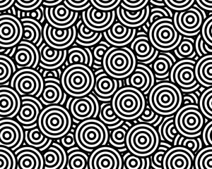 Overlapping concentric circles in a repeating black and white wave pattern, seamless pattern