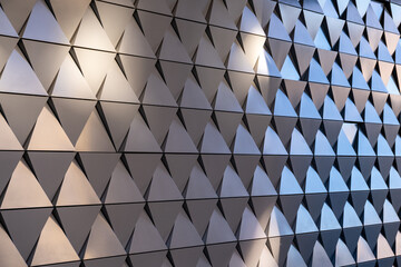Geometric wall background with triangles.