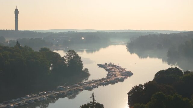 Telephoto sunset aerial view over Djurg&aring;rdsbrunnsviken with docked boats