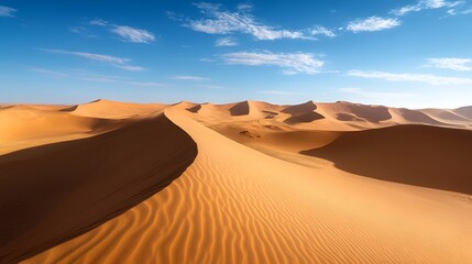 Natural background of a desert landscape with soft sand dunes and a clear blue sky, warm earthy tones