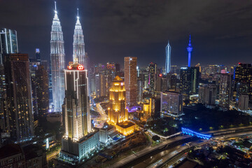 view of the city's vibrant energy, captured in the glow of countless lights.